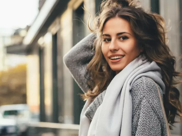 Woman with luscious wavy dream hair on the street